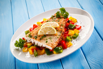 Fish dish - fried fish fillet and vegetables 