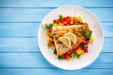 Fish dish - fried fish fillet and vegetables 