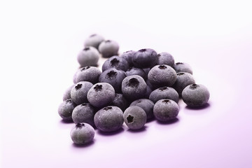 Frosted blueberries on a kitchen counter.