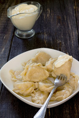 Dumplings with potato in rustic style, selective focus.