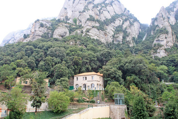 Fototapeta na wymiar MONTSERRAT, SPAIN - AUGUST 28, 2012: Station of the funicular de Sant Joan at the Benedictine abbey Santa Maria de Montserrat