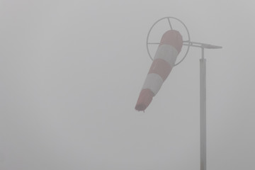 windsock in a foggy day
