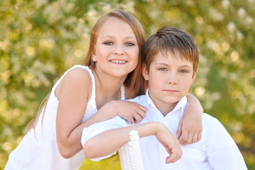 Portrait of a boy and girl  in summer