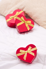 gift boxes with heart shape in the bedroom