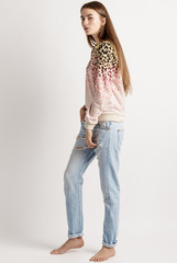 young woman in a blouse and jeans