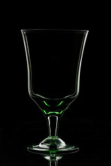 Empty glass on black background