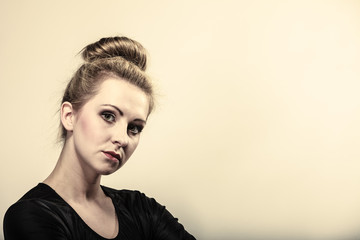 girl blonde woman in hair bun