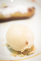 Dish of ice cream dessert on restaurant table