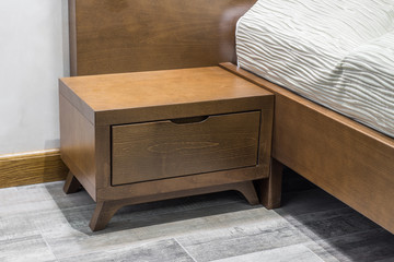 Close up of night table in bedroom interior
