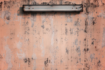 empty panel lamp with grunge wall.