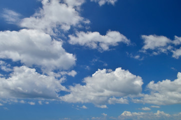 Naklejka na ściany i meble White clouds and blue sky with sun light.