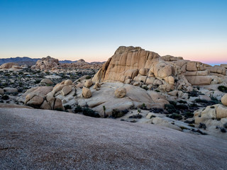 Jumbo Rocks at sunset in Joshua Tree National Park, California, USA. - obrazy, fototapety, plakaty