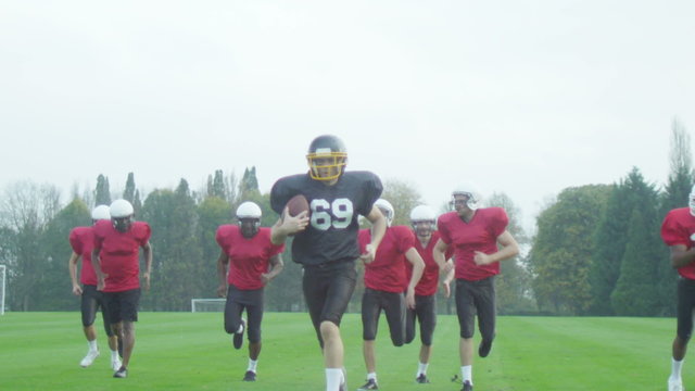 American football players at team practice