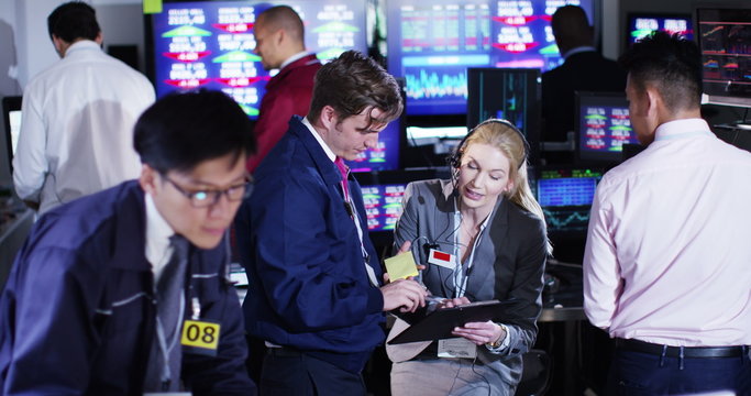  Timelapse of city stockmarket traders at work in a chaotic trading room