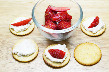 spread tuna and strawberry on biscuit 