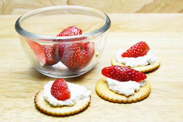 spread tuna and strawberry on biscuit 