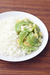 Stir fried bitter gourd with egg on rice