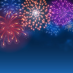 Festive firework bursting in various shapes and colors sparkling on blue sky background. Abstract vector illustration.