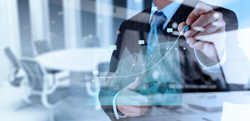 businessman hand working witdouble exposure of businessman hand