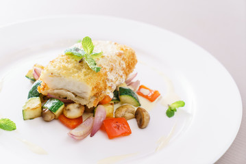 fried fish with salad