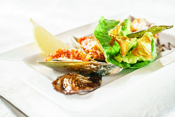 mussels baked with parmesan and herbs