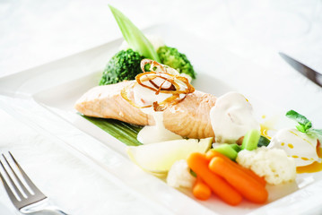 salmon steak with vegetables