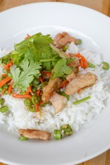 pork and vegetable fried on hot rice - Thailand healthy food