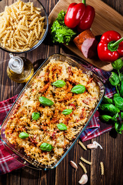 Casserole fusilli pasta with sausage, zucchini and cheese