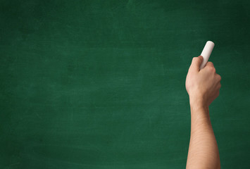 Hand writing on clean blackboard