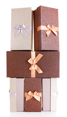 Beautiful brown and silver Christmas gifts isolated on white background