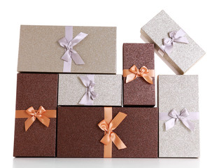 Beautiful brown and silver Christmas gifts isolated on white background