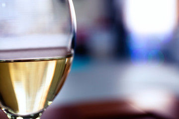 Glass of wine on blurred background