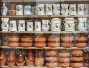 Sale of ceramic vases, plates, and glasses that are typical of gargano, Puglia, Italy.