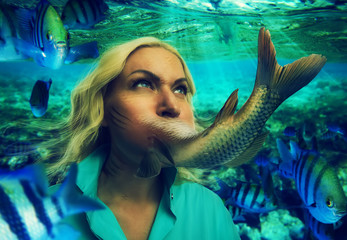 Woman eating fish