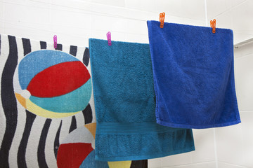 three towels drying on the clothesline