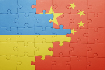 puzzle with the national flag of ukraine and china