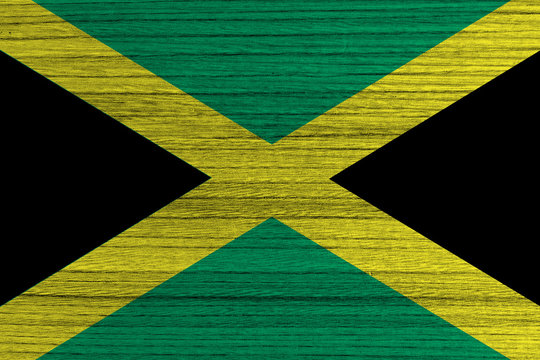 Jamaica Flag painted on wood background 
