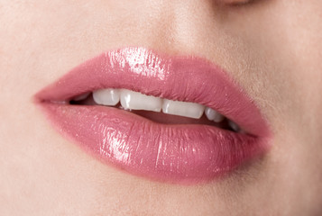 Fototapeta premium Halloween makeup. Expression rock style lip make-up like a vampire, dark romantic. Fashion look, glitter, multicolor, soft focus 