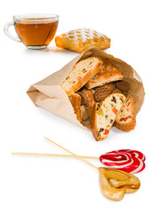Isolated image of a cup of tea and cookies on a white background