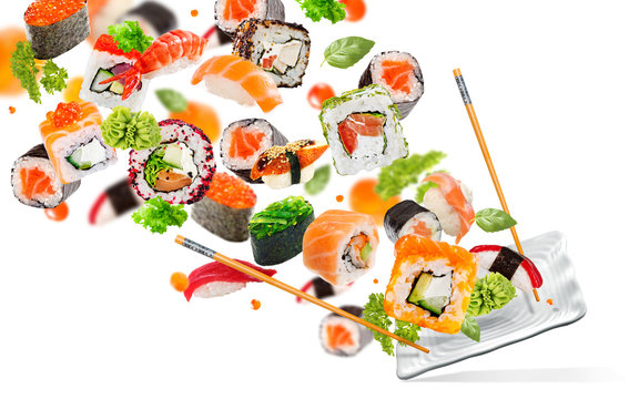 Delicious pieces of sushi, isolated on white background