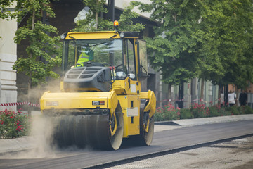 Heavy Vibration roller compactor at asphalt pavement works