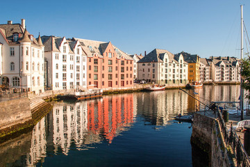 Obraz premium Trondheim, Norway. Multicolored houses in the river bank are ref