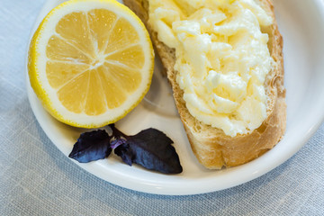 sandwich with butter and lemon
