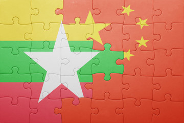 puzzle with the national flag of myanmar and china