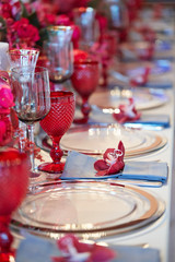 Table setting set with candles and flowers