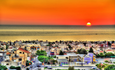 Fototapeta na wymiar Sunset above the city of Paphos - Cyprus