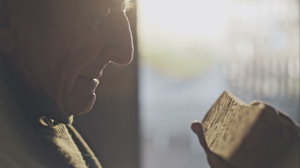 Old master handmade wood touches the wooden boards and feels it.