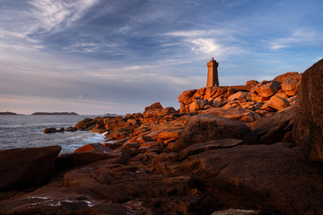 Le phare de Mean Ruz, Ploumanach, Bretagne, France at sunset