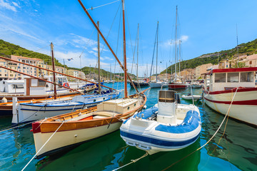 Colorful typical fishing boat in Bonifacio port, Corsica island, France