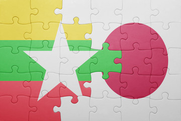 puzzle with the national flag of myanmar and japan